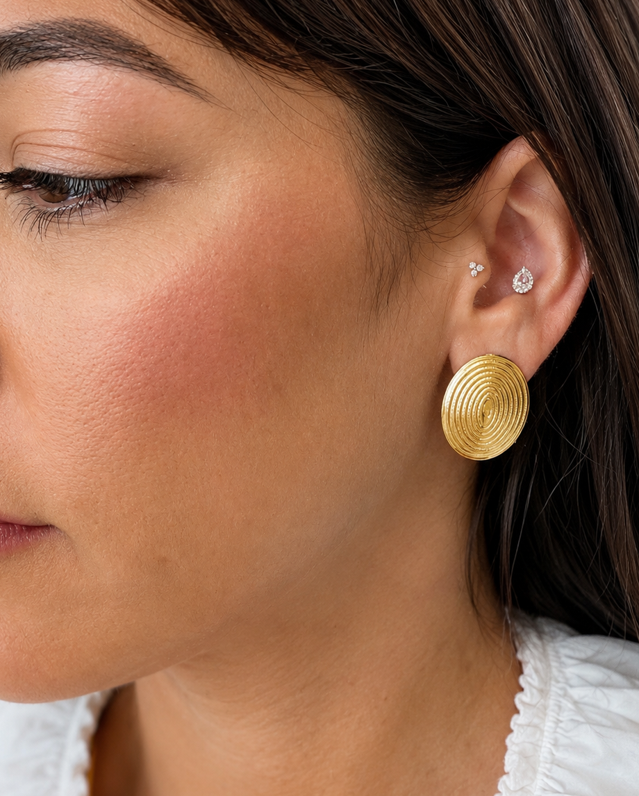 Aretes Coins