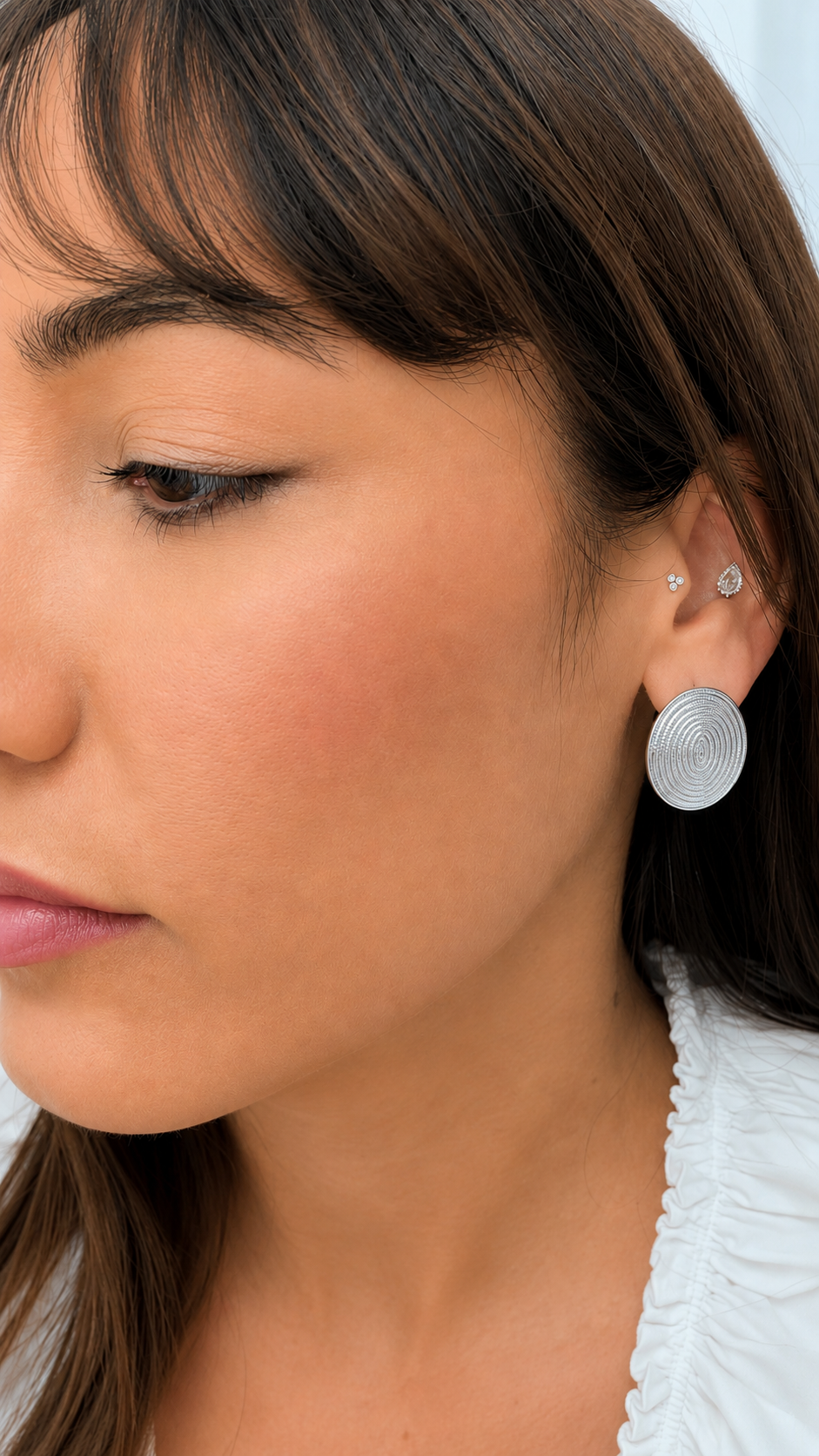 Aretes Coins