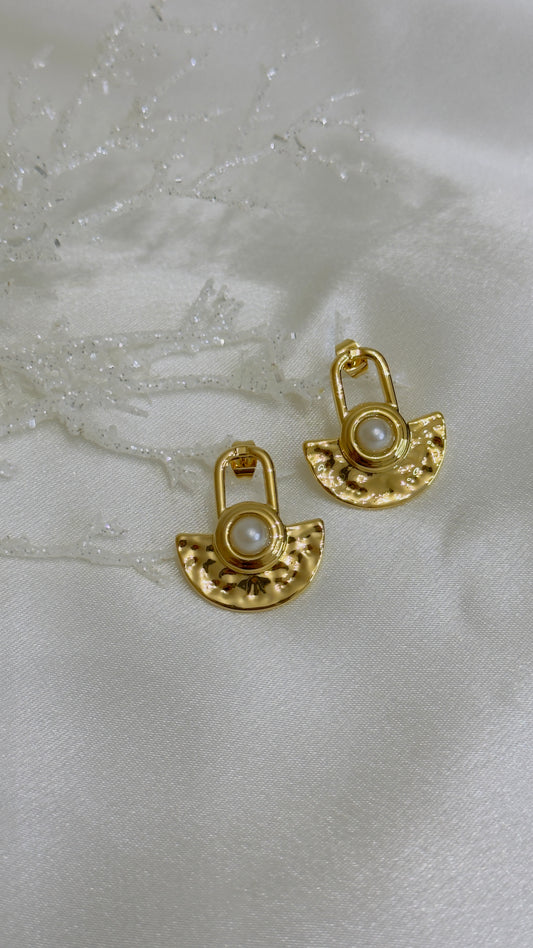 Aretes Torry