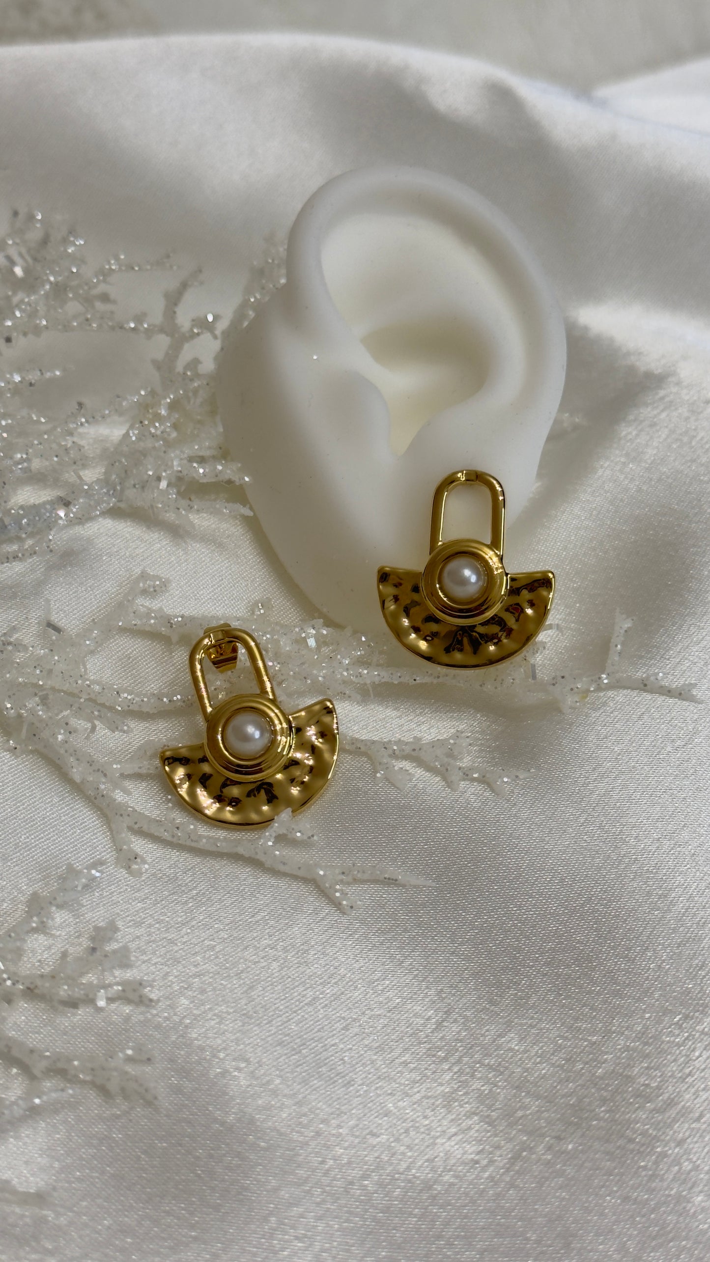 Aretes Torry